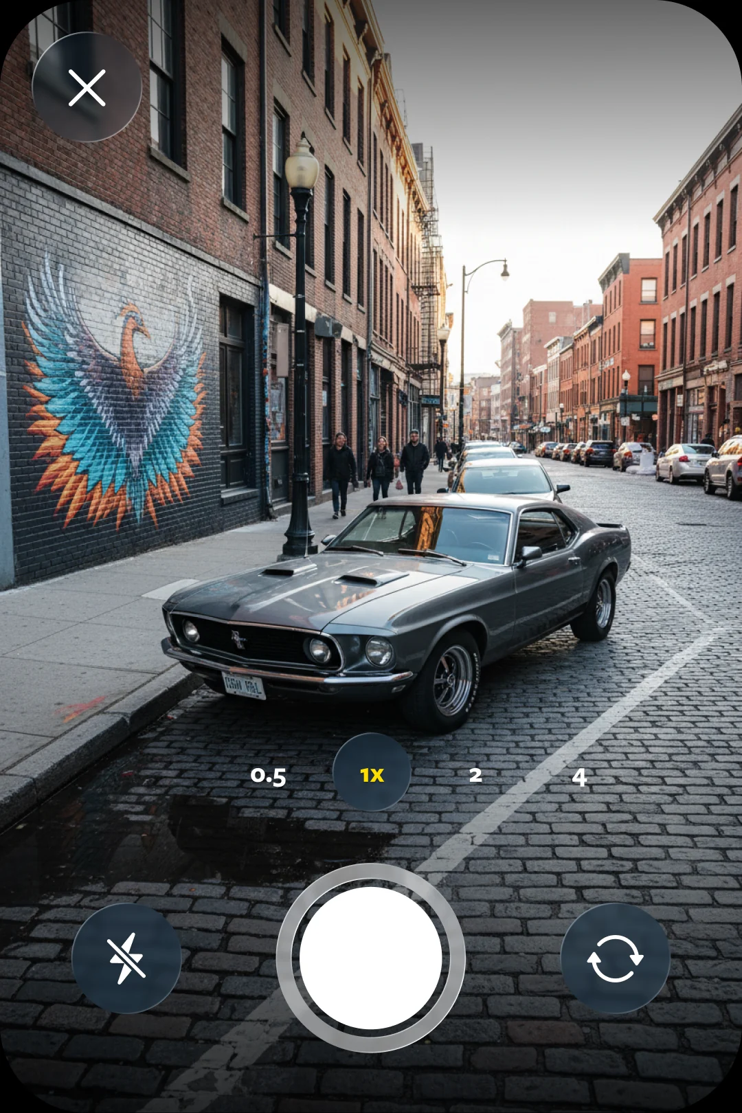 In-app camera shot of a vintage car on a city street, ready to be saved as a spot.